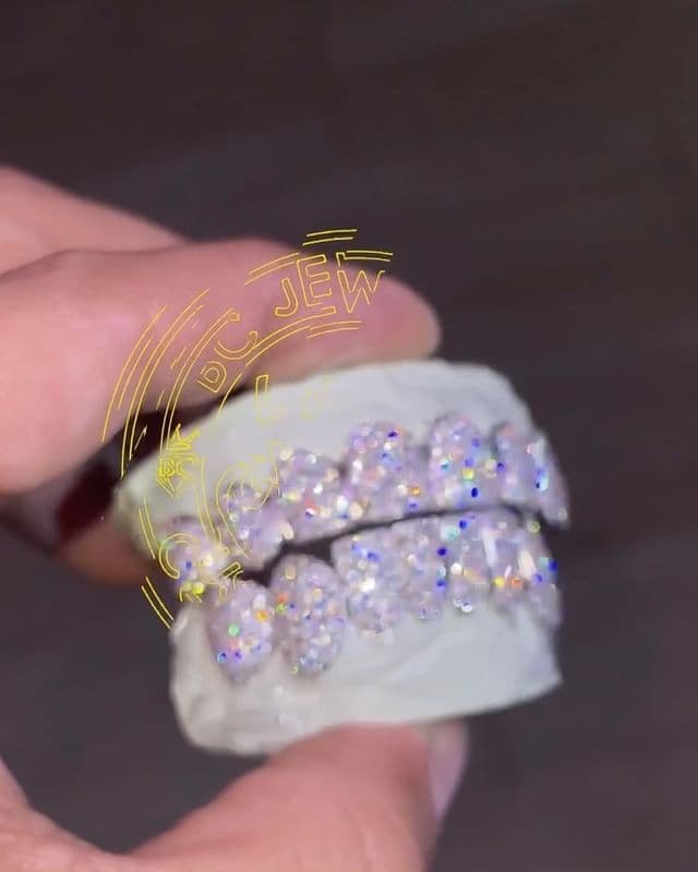 Every stone picked out one by one by a GIA certified jeweler. Vvs1 F color diamond tightly zig Zag s